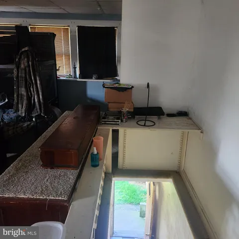 a bathroom with a toilet and a sink