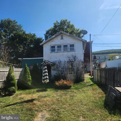a building view with a brick wall