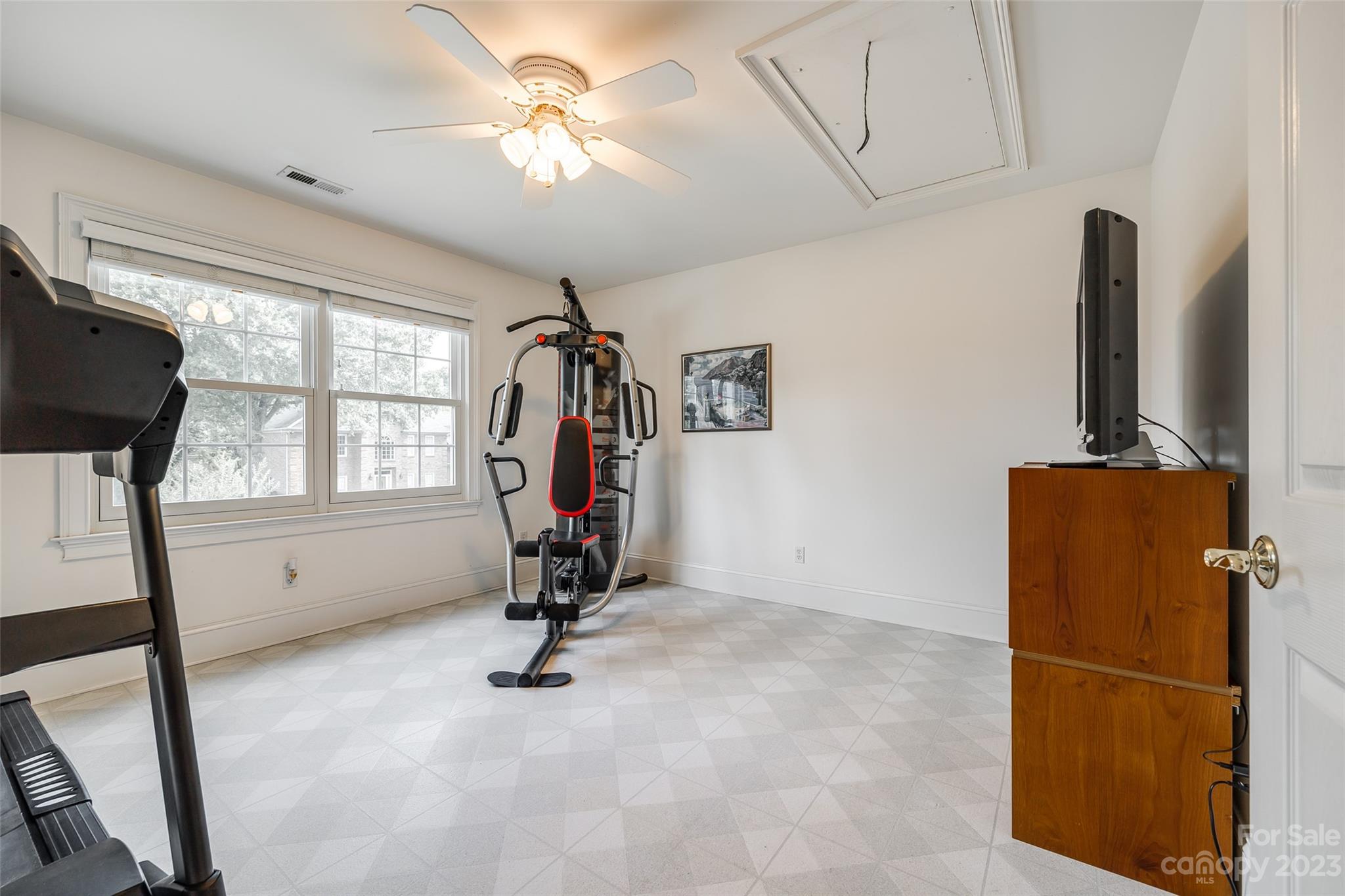 208 Chesterfield Canal Fort Mill, SC 29708 - Photo 20 of 48 a view of a room with gym equipment