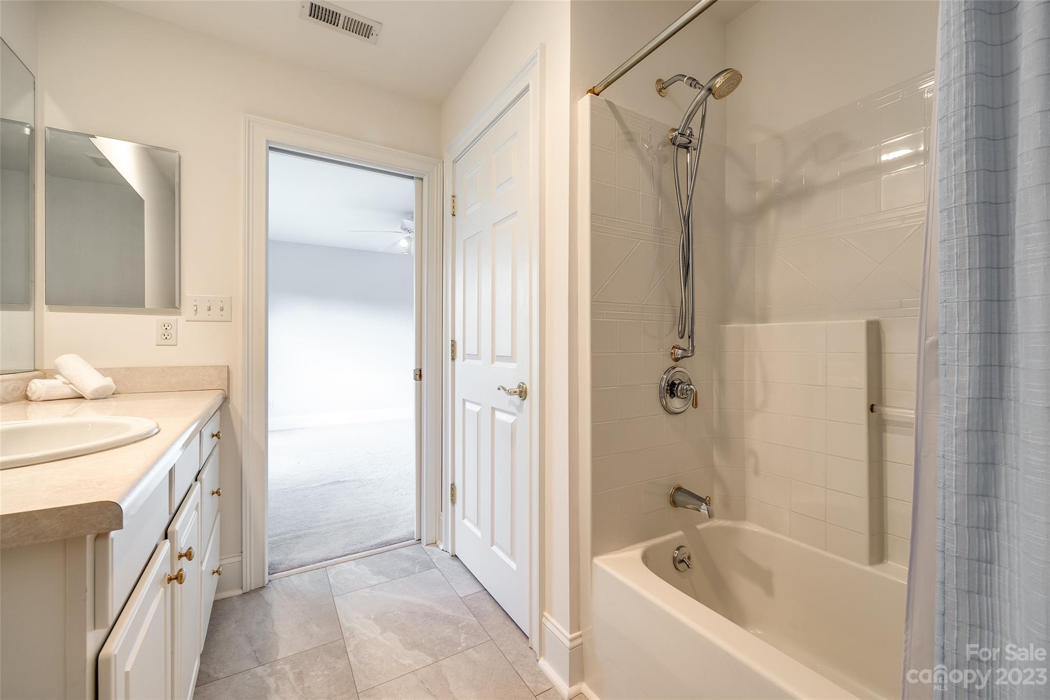 208 Chesterfield Canal Fort Mill, SC 29708 - Photo 22 of 48 a bathroom with a bathtub shower and a sink