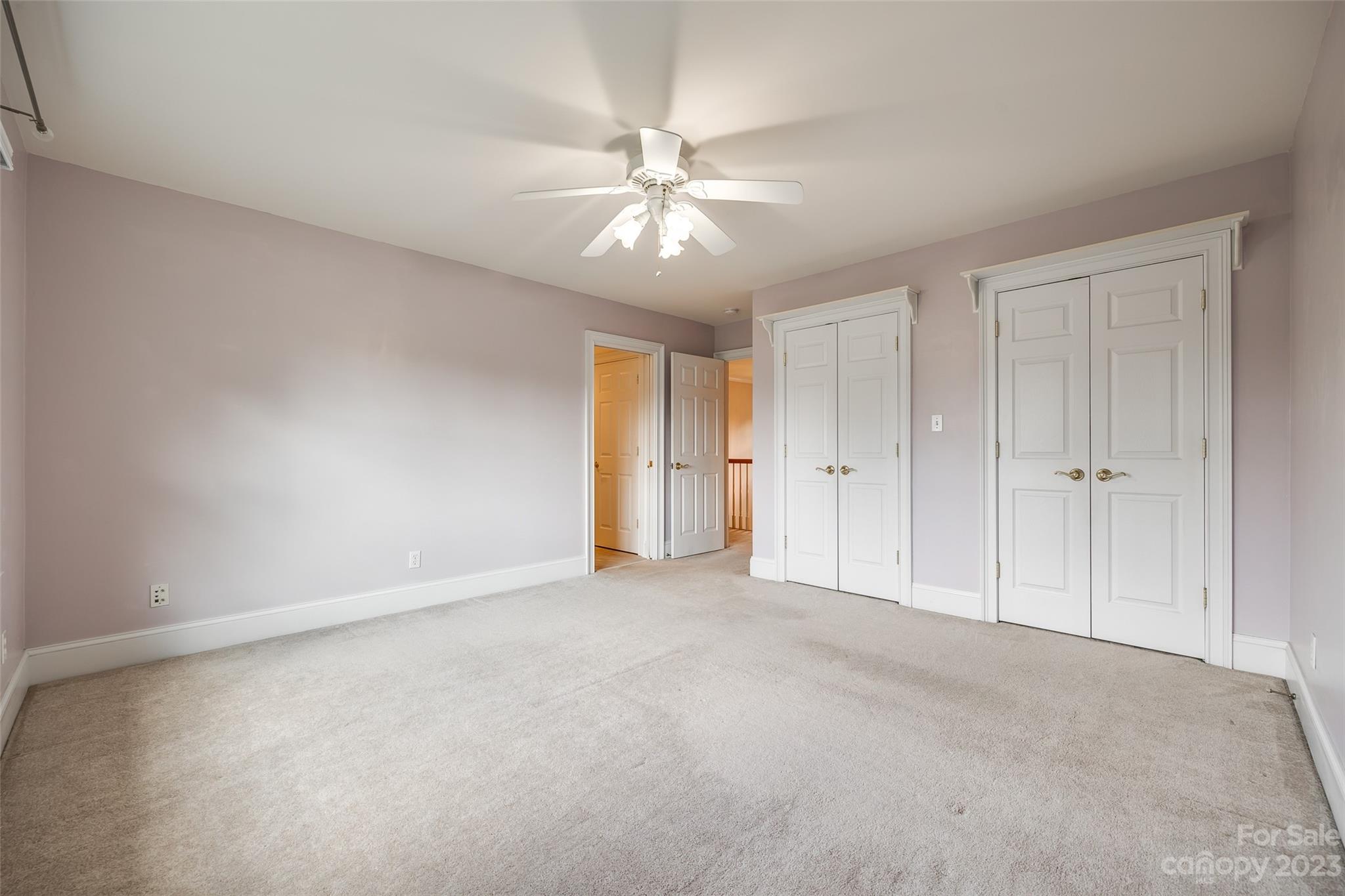 208 Chesterfield Canal Fort Mill, SC 29708 - Photo 23 of 48 a view of an empty room and chandelier fan