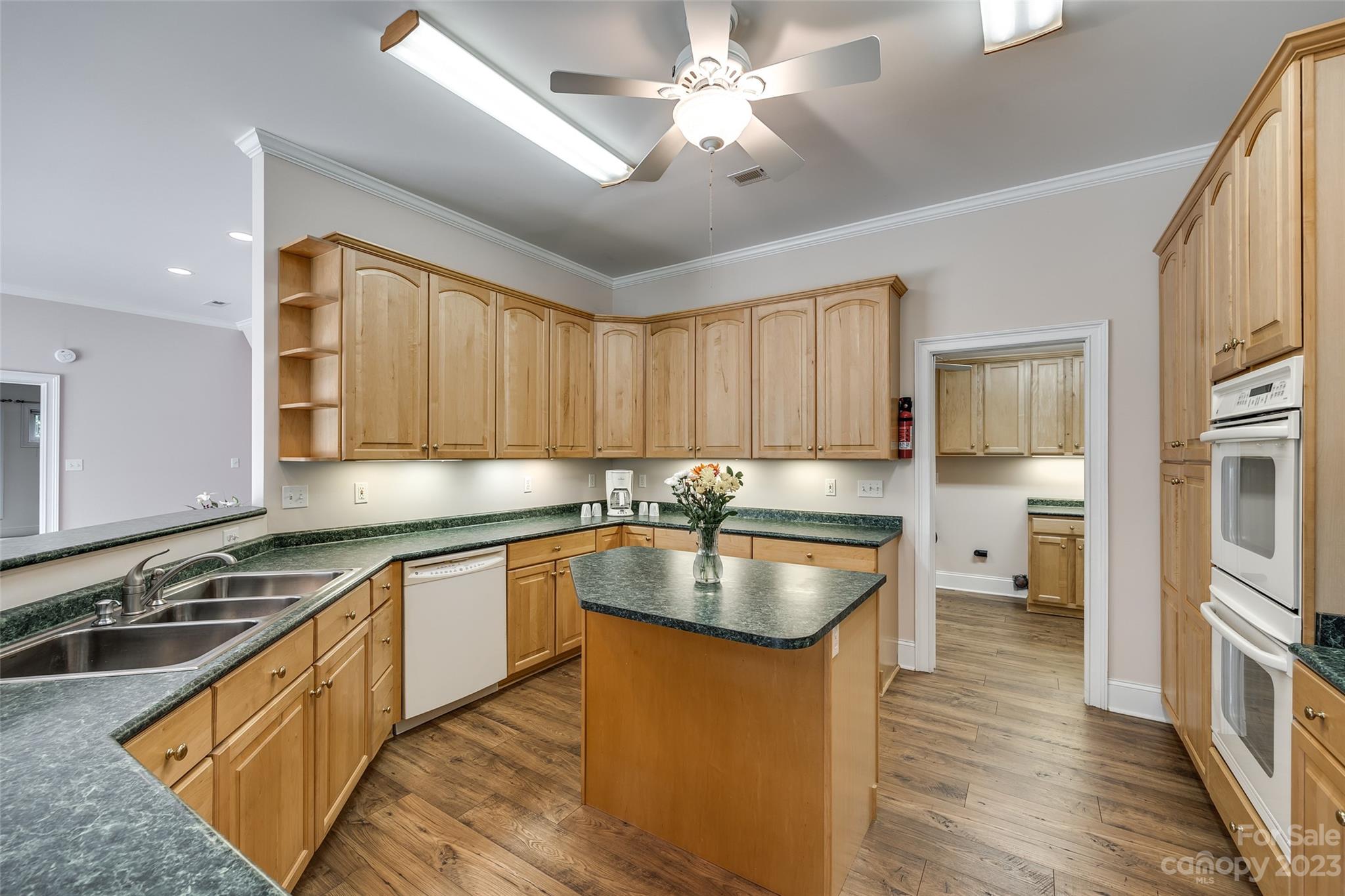 208 Chesterfield Canal Fort Mill, SC 29708 - Photo 33 of 48 a kitchen with stainless steel appliances granite countertop a sink stove and refrigerator