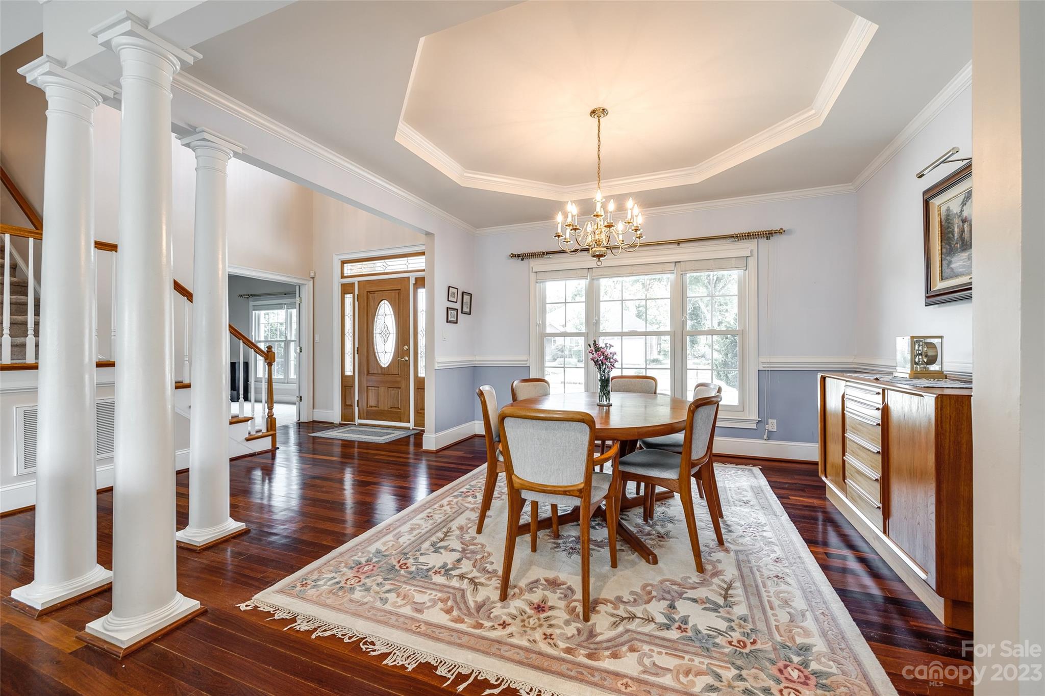 208 Chesterfield Canal Fort Mill, SC 29708 - Photo 8 of 48 a dining room with wooden floor and chandelier