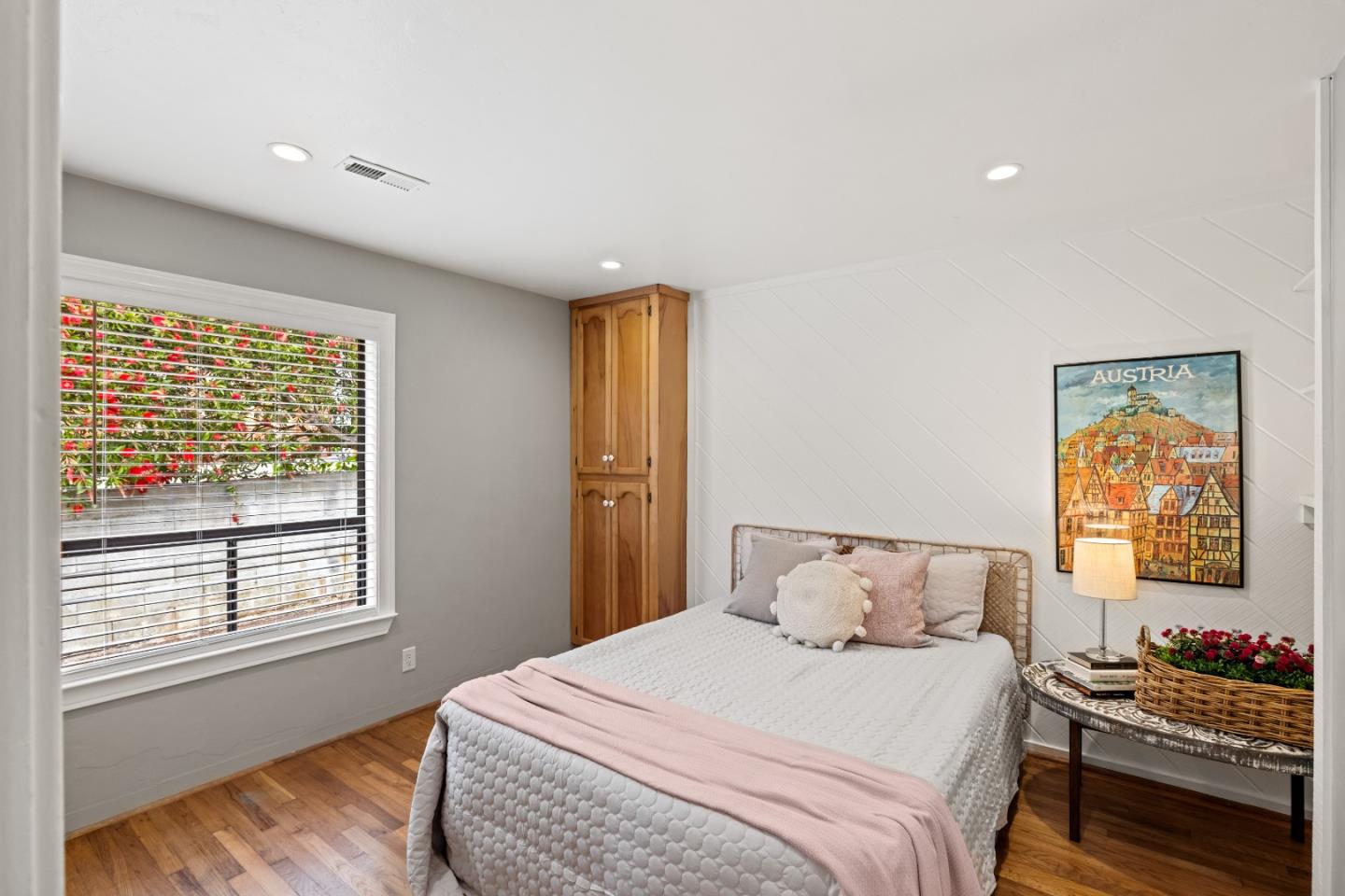 329 Stuart Avenue Pacific Grove, CA 93950 - Photo 13 of 21 a bedroom with a bed and wooden floor