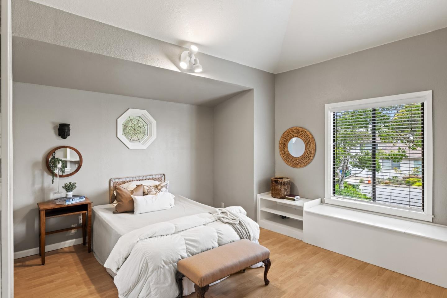 329 Stuart Avenue Pacific Grove, CA 93950 - Photo 17 of 21 a bedroom with a bed and a window