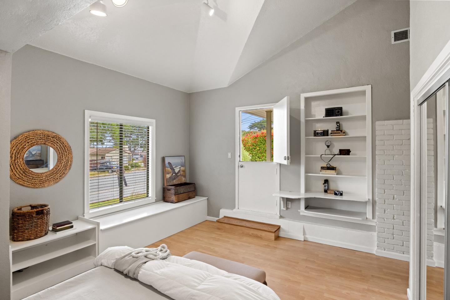 329 Stuart Avenue Pacific Grove, CA 93950 - Photo 18 of 21 a bedroom with a bed and a window