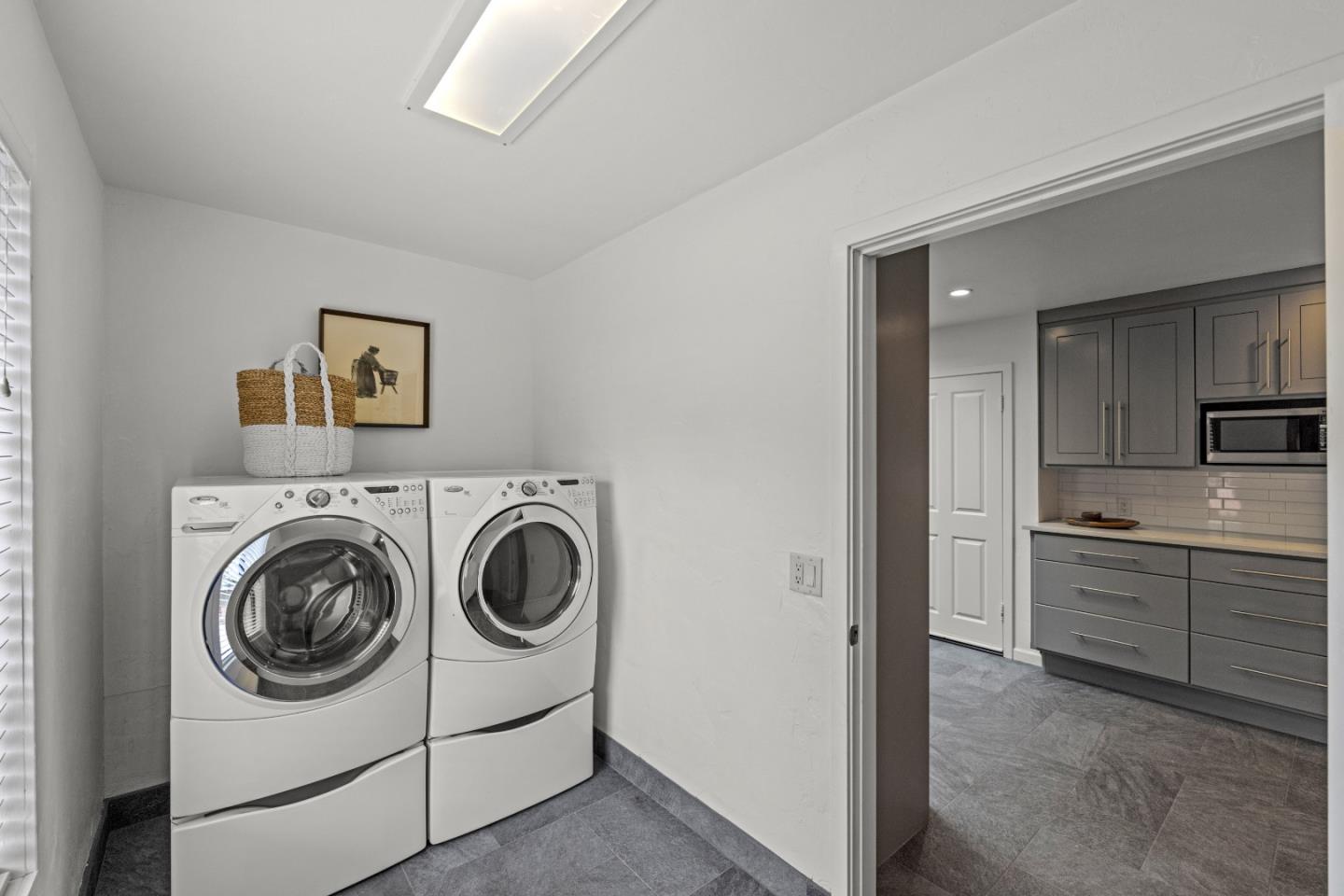 329 Stuart Avenue Pacific Grove, CA 93950 - Photo 19 of 21 a utility room with sink dryer and washer