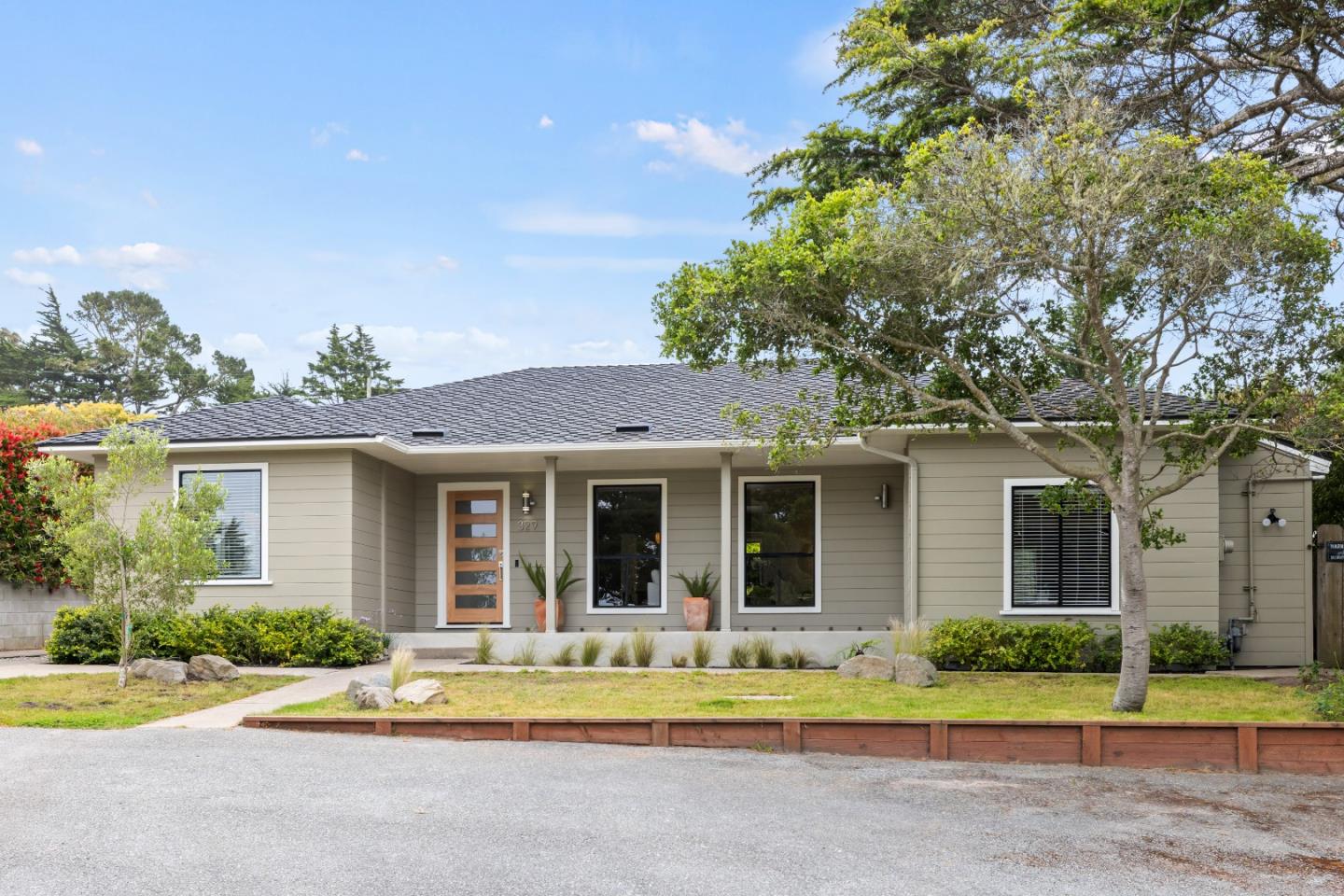 329 Stuart Avenue Pacific Grove, CA 93950 - Photo 2 of 21 front view of a house with a yard