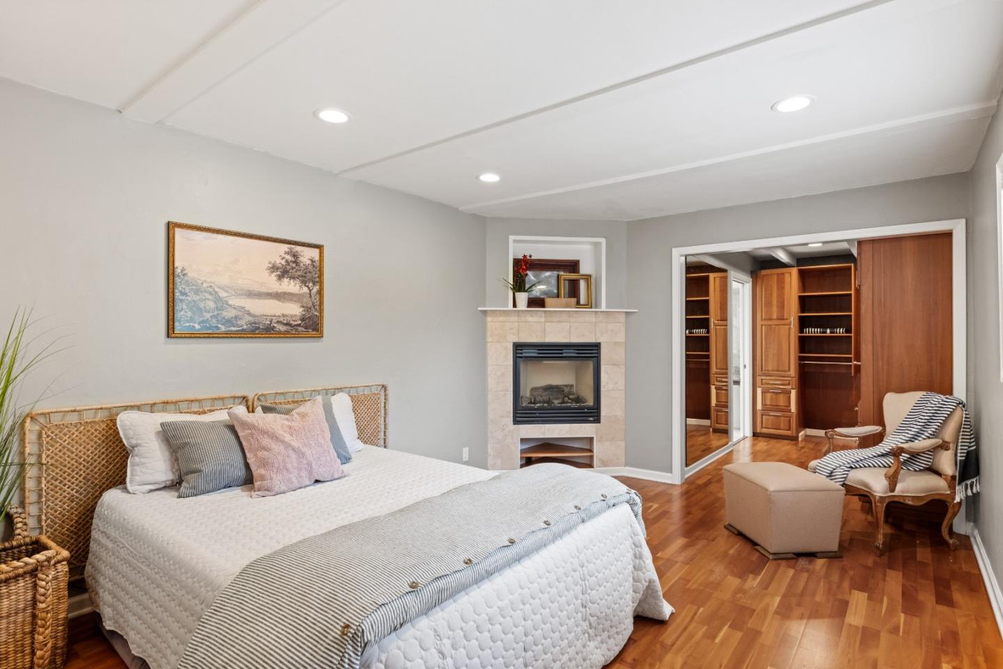 329 Stuart Avenue Pacific Grove, CA 93950 - Photo 10 of 21 a bedroom with bed and wooden floor