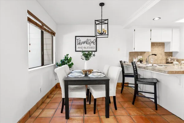 a view of a dining room with furniture
