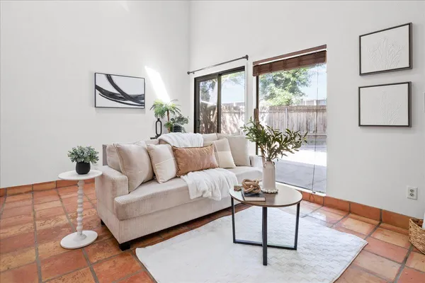 a living room with furniture and a window