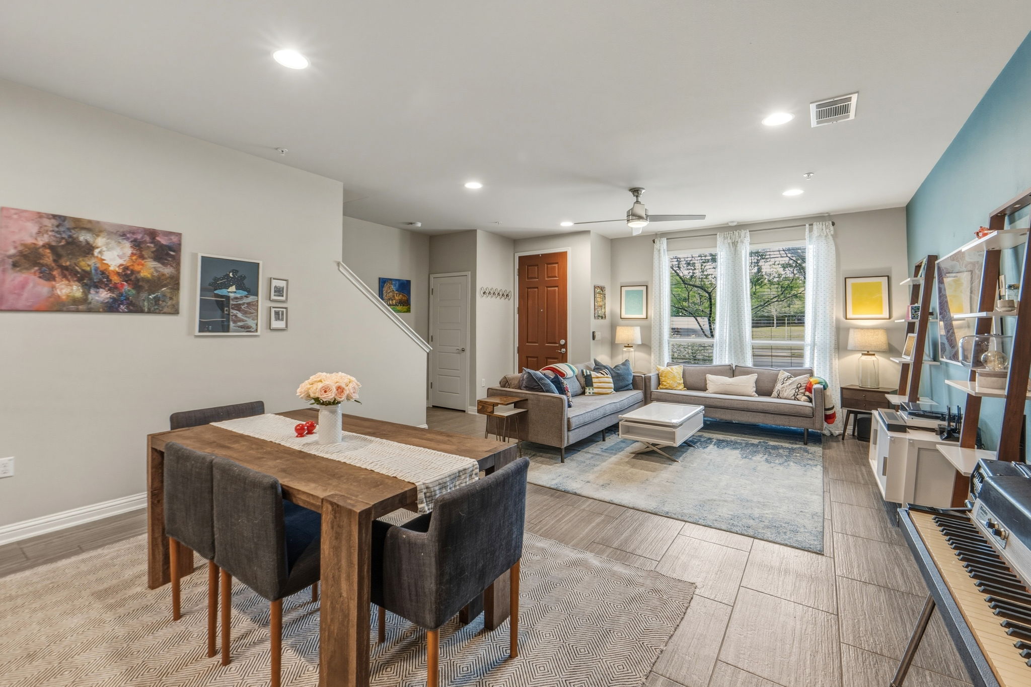 6814 East Riverside Drive, Unit 34 Austin, TX 78741 - Photo 8 of 26 a living room with furniture and a flat screen tv
