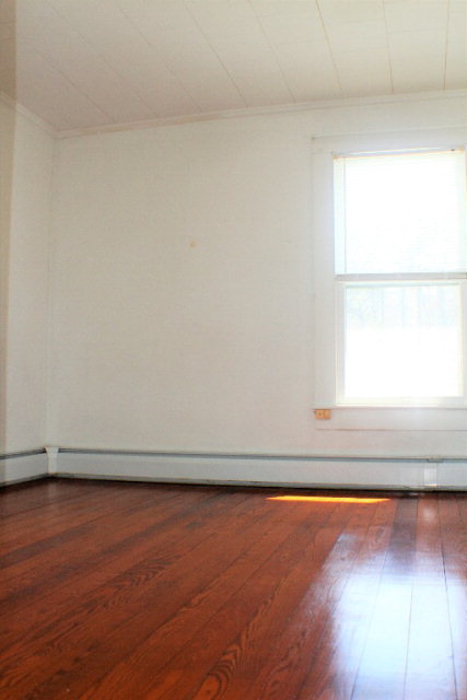 9593 Atlantic Road Atlantic, VA 23303 - Photo 15 of 20 a view of a room with wooden floor and a window