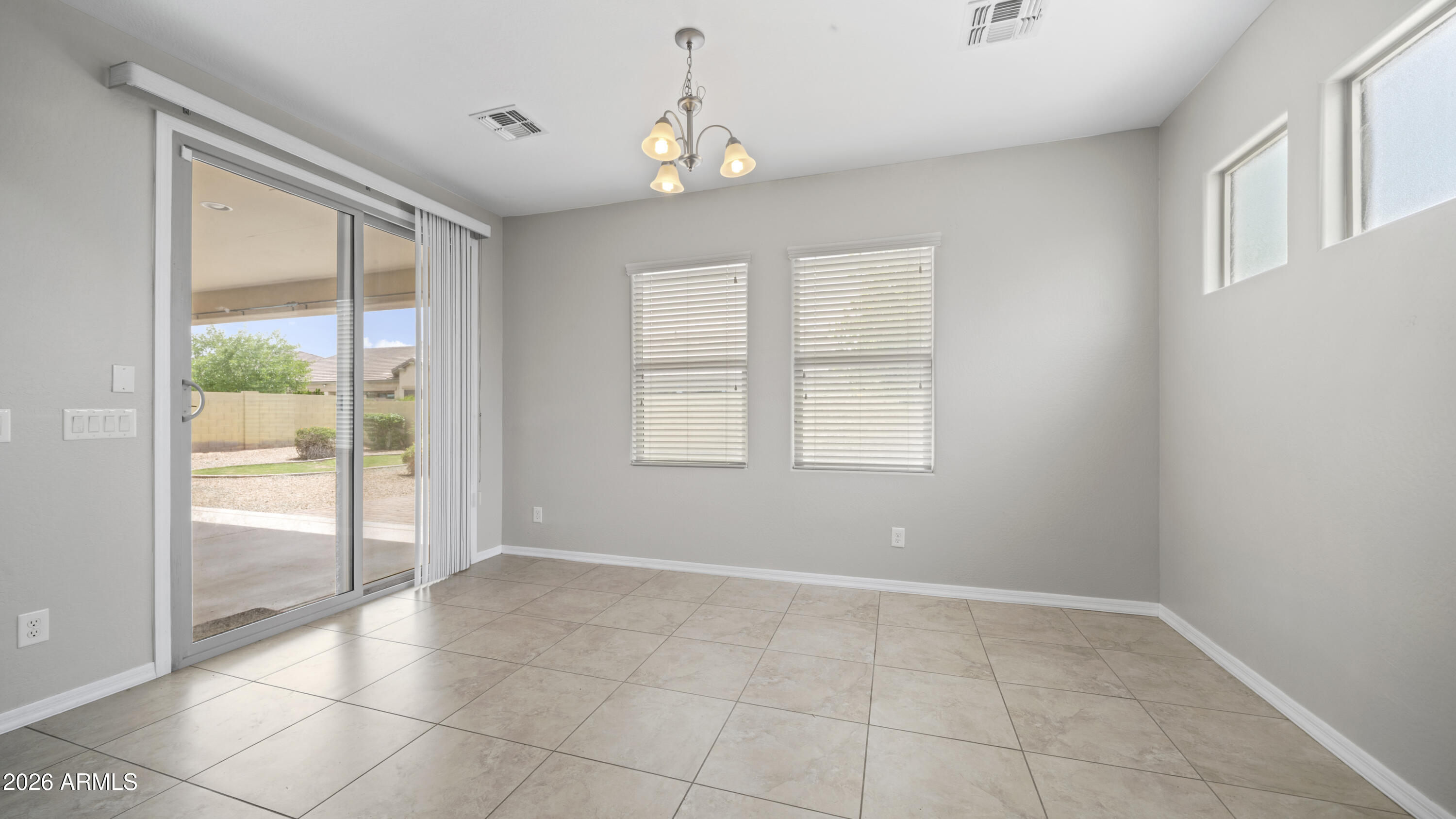 16159 West Granada Road Goodyear, AZ 85395 - Photo 18 of 41 a view of an empty room with a window