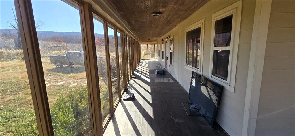 1350 Stivers Road Jasper, GA 30143 - Photo 68 of 70 a view of a hallway with wooden floor and stairs