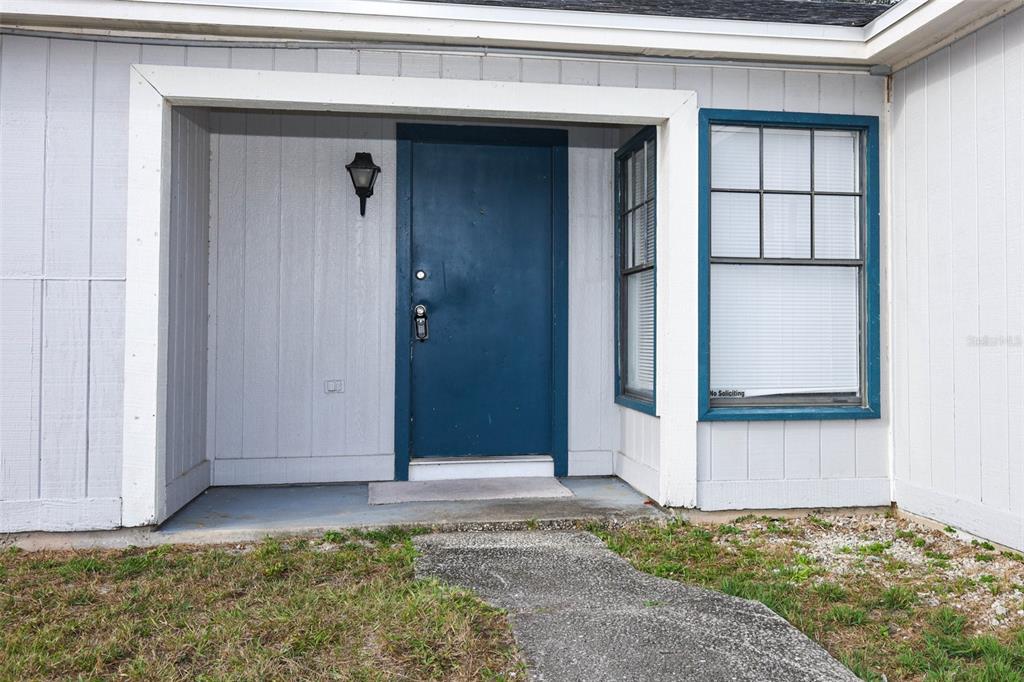 3240 Littlefield Street Deltona, FL 32738 - Photo 2 of 18 a view of an entrance to house