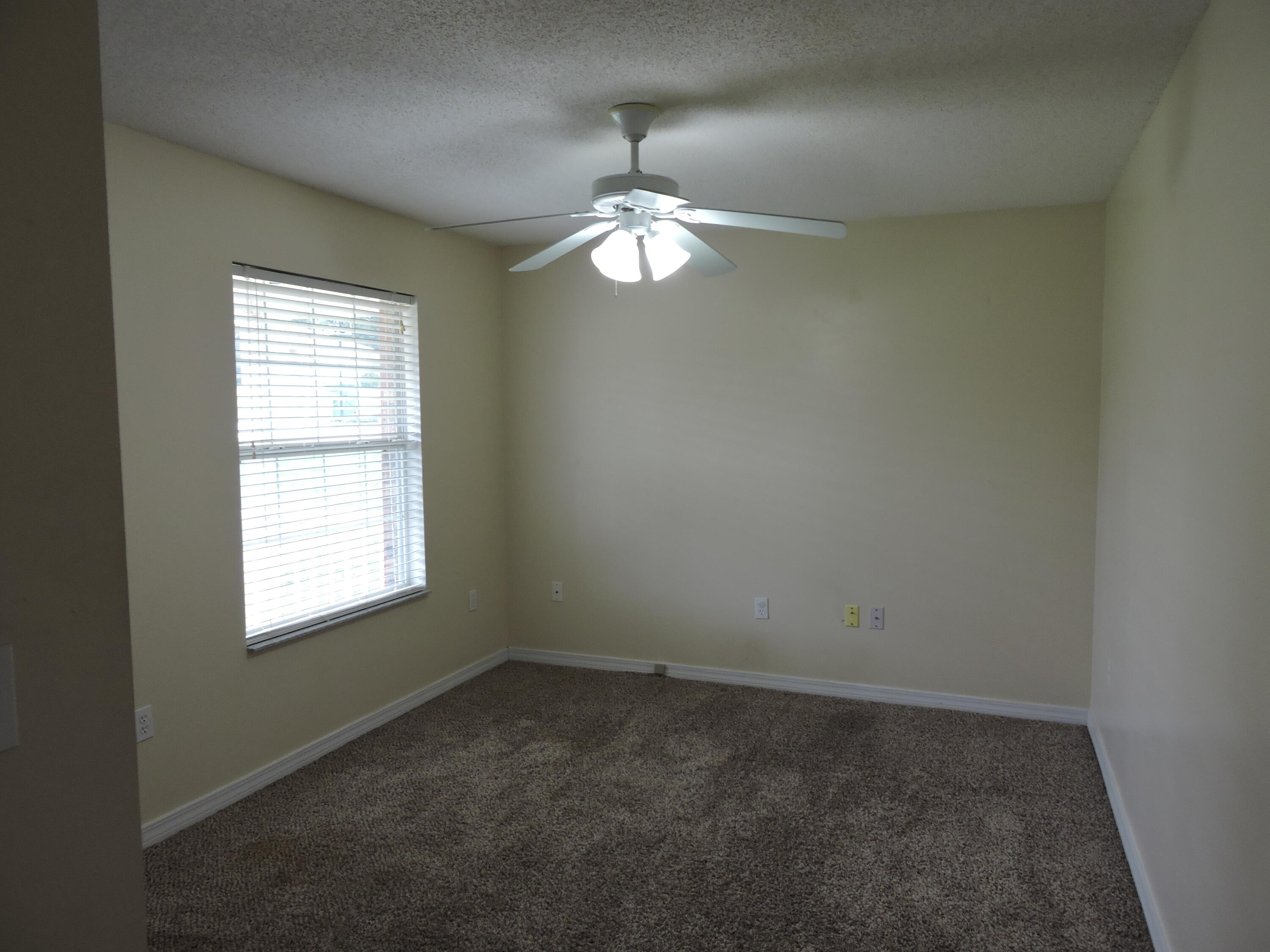 178 Cabana Way Crestview, FL 32536 - Photo 2 of 20 an empty room with a window