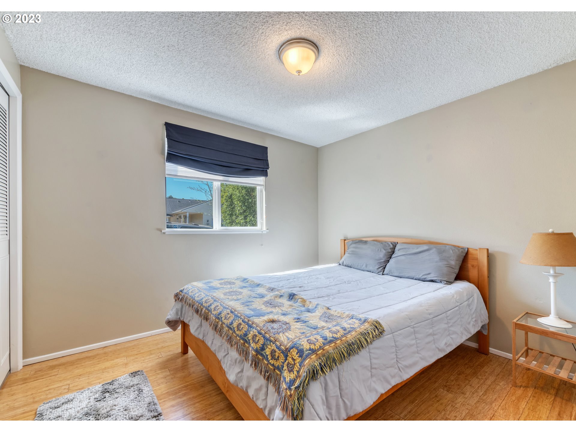 636 Island Street Springfield, OR 97477 - Photo 18 of 25 a bedroom with a bed and a window