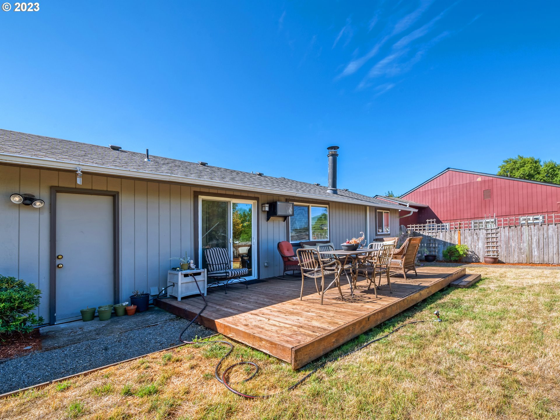 636 Island Street Springfield, OR 97477 - Photo 21 of 25 a view of a patio with chairs and tables in the patio