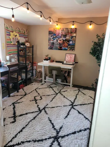 a view of a terrace with wooden floor