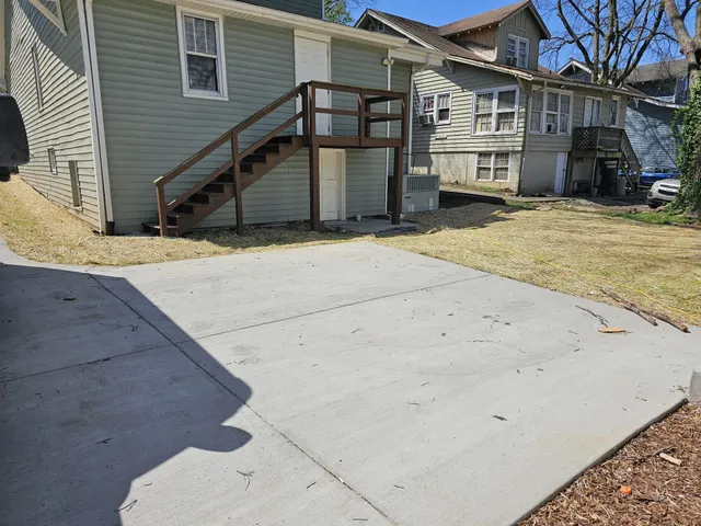 a front view of a house with stairs