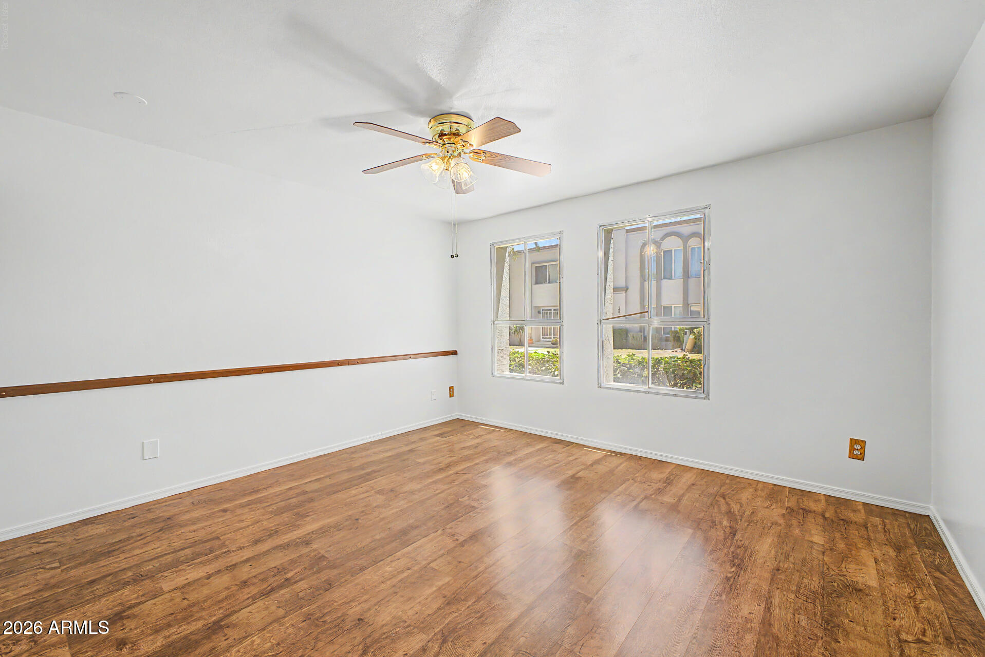 5873 East Thomas Road Scottsdale, AZ 85251 - Photo 11 of 30 a view of an empty room with a window