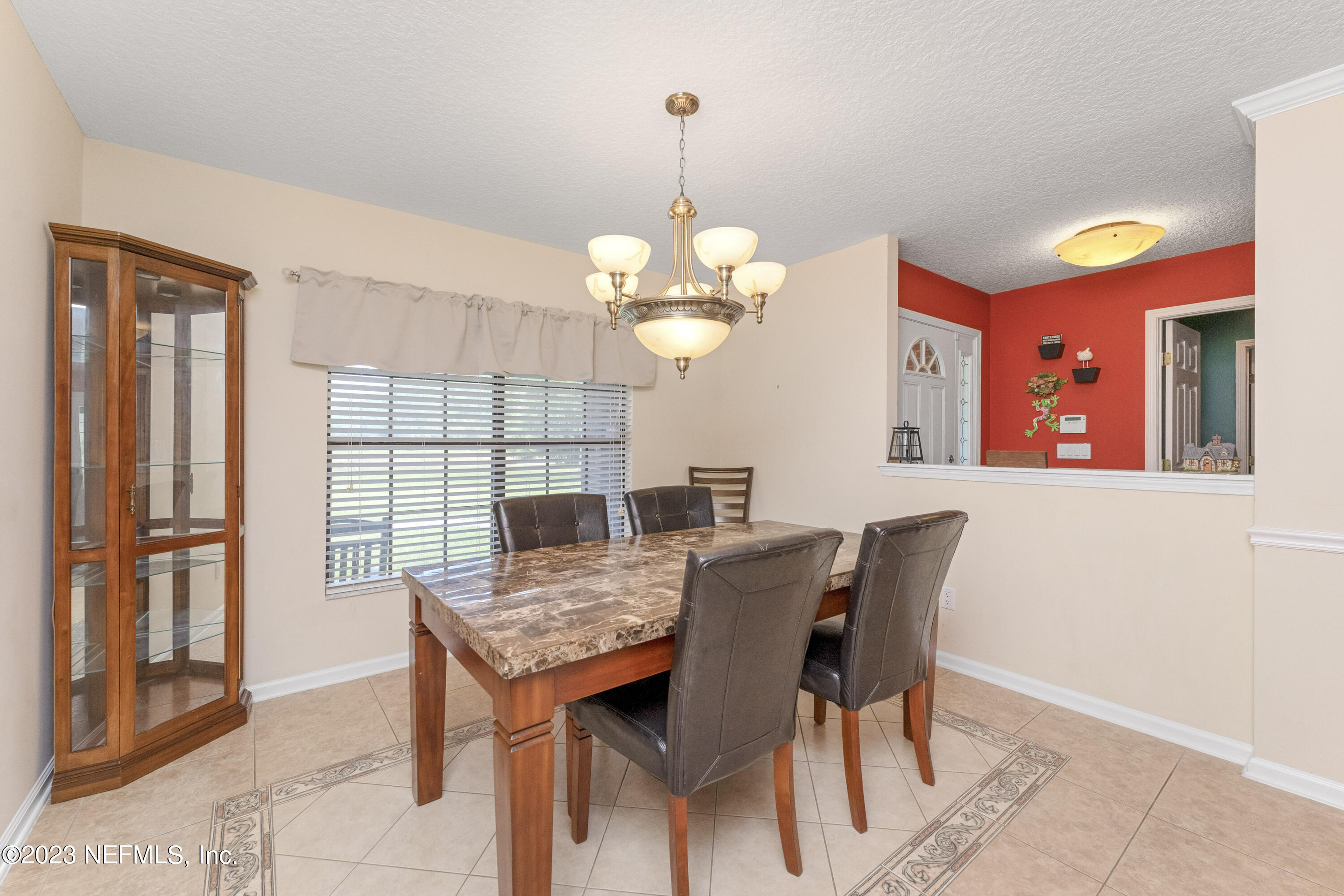 14322 Grover Road Jacksonville, FL 32226 - Photo 11 of 41 11 formal dining with tile inlay