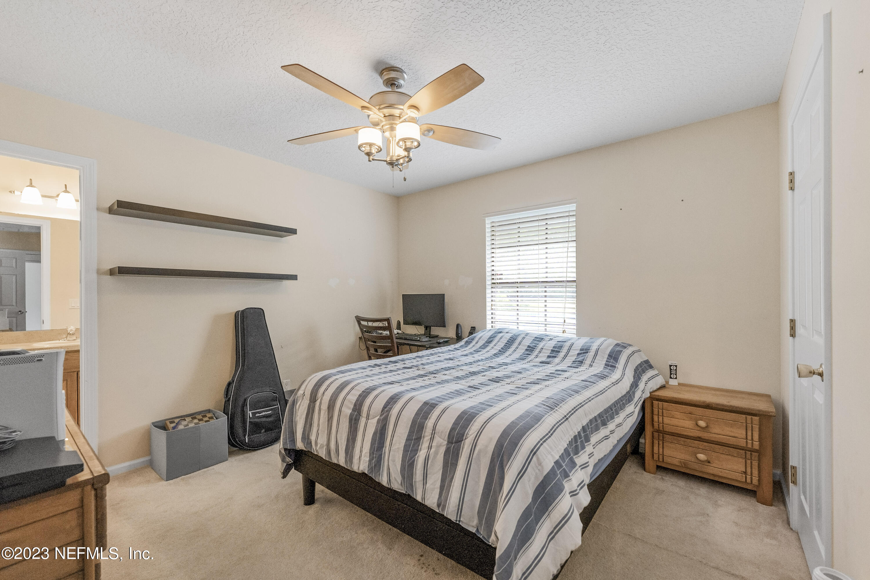 14322 Grover Road Jacksonville, FL 32226 - Photo 24 of 41 24 bedroom 2 with ensuite bath and priva