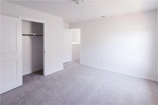an aerial view of a house with a swimming pool