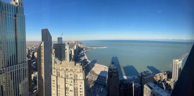 a view of a balcony with furniture