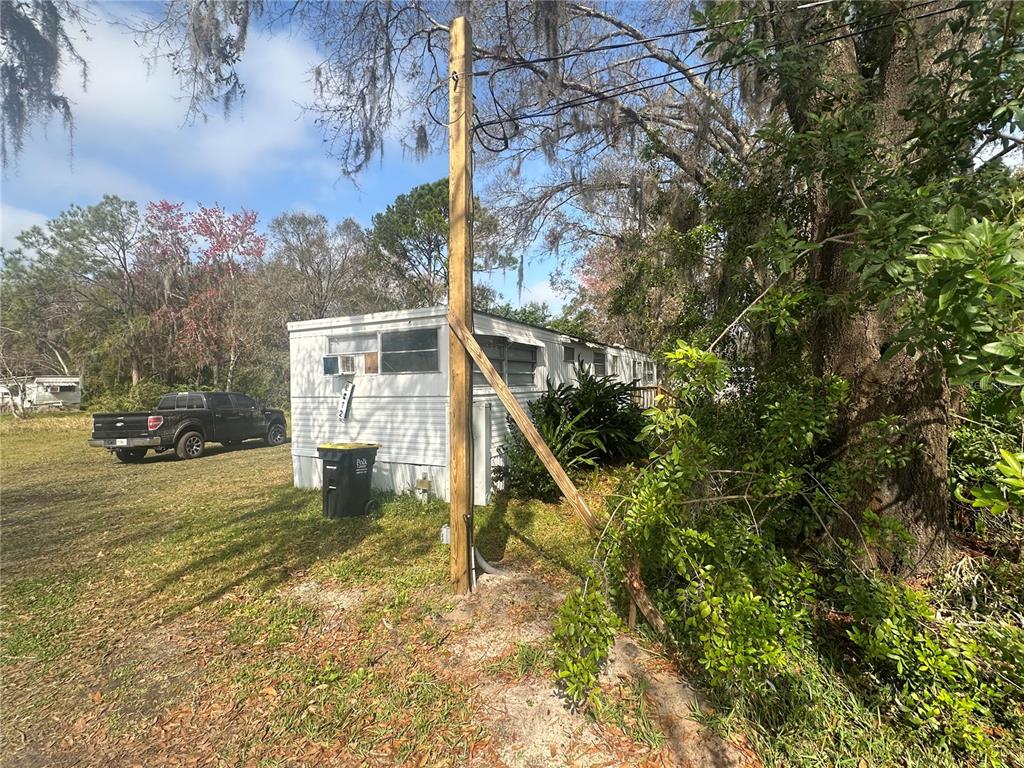 2218 Ellie Road, Unit 1 Auburndale, FL 33823 - Photo 18 of 21 a house view with a outdoor space