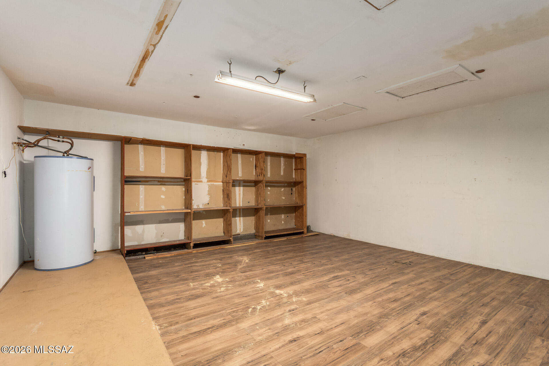 5331 West Eaglestone Loop Tucson, AZ 85742 - Photo 27 of 35 an empty room with windows