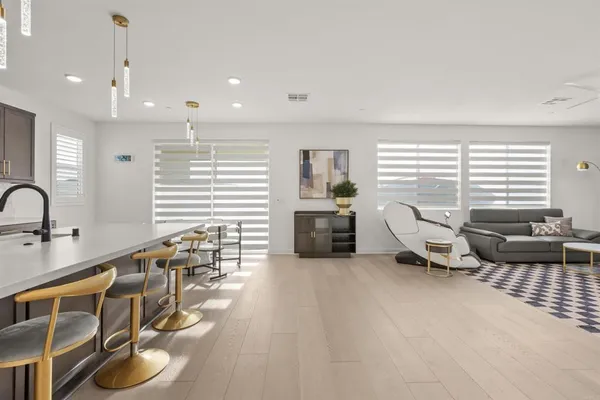 a view of bathroom with a toilet a sink and a mirror