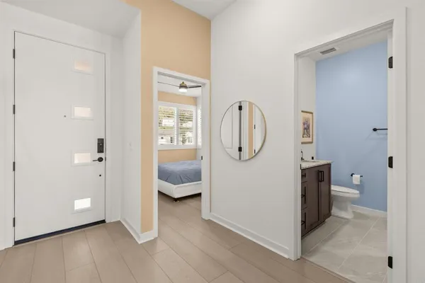 a bed room with a bed and a window