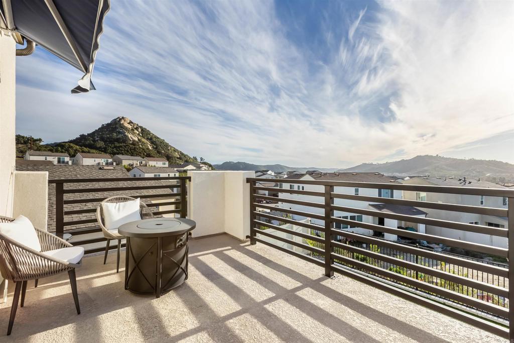550 Meadowood Street Fallbrook, CA 92028 - Photo 27 of 37 a view of a chairs and table on the roof