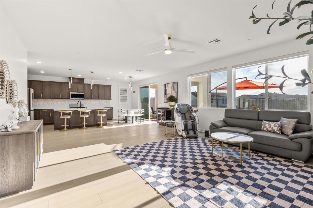 550 Meadowood Street Fallbrook, CA 92028 - Photo 3 of 37 a living room with furniture and a view of kitchen