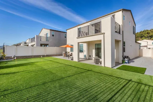a swimming pool with a outdoor seating