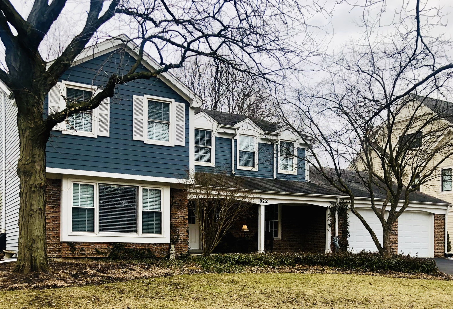822 West Bauer Road Naperville, IL 60563 - Photo 1 of 3 a front view of a house with a yard