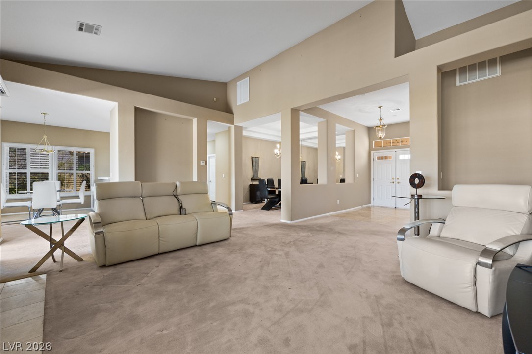 649 Rancho Circle Mesquite, NV 89027 - Photo 16 of 73 Bright and airy living spaces flow seamlessly, creating an inviting atmosphere for daily living.