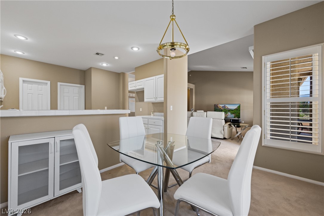 649 Rancho Circle Mesquite, NV 89027 - Photo 19 of 73 This inviting dining area features ample natural light and seamless flow into adjacent living spaces.
