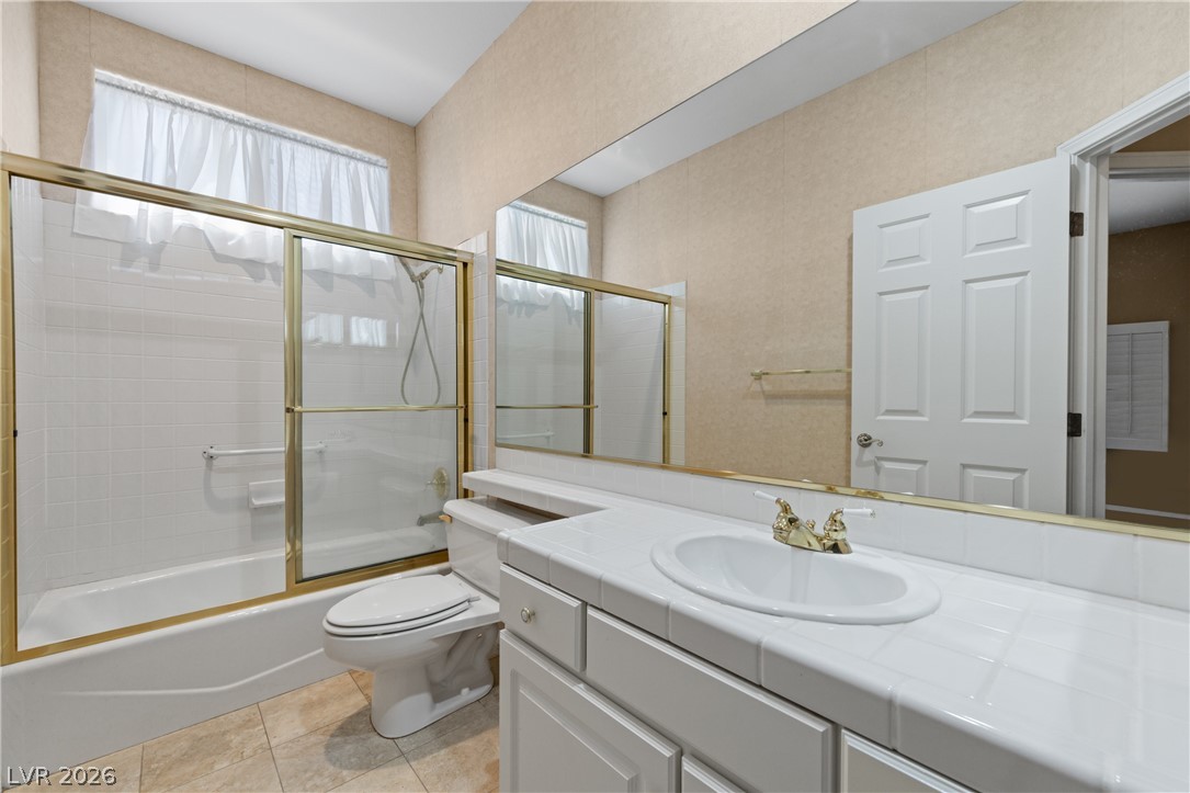 649 Rancho Circle Mesquite, NV 89027 - Photo 31 of 73 This bathroom features a shower and tub combination, perfect for a refreshing start to your day.