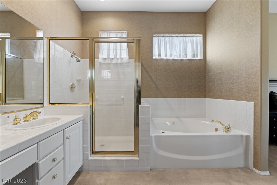 649 Rancho Circle Mesquite, NV 89027 - Photo 38 of 73 This primary bathroom offers a shower and a soaking tub.