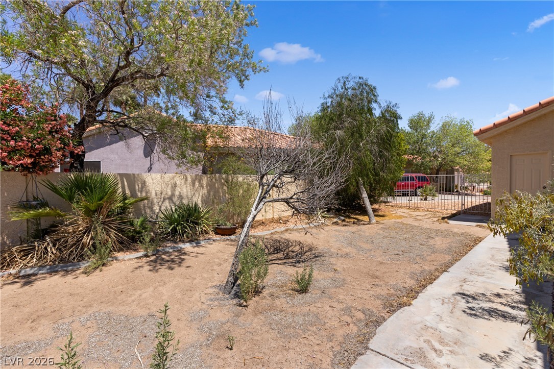 649 Rancho Circle Mesquite, NV 89027 - Photo 41 of 73 This private yard offers a spacious outdoor area for relaxation and potential landscaping.