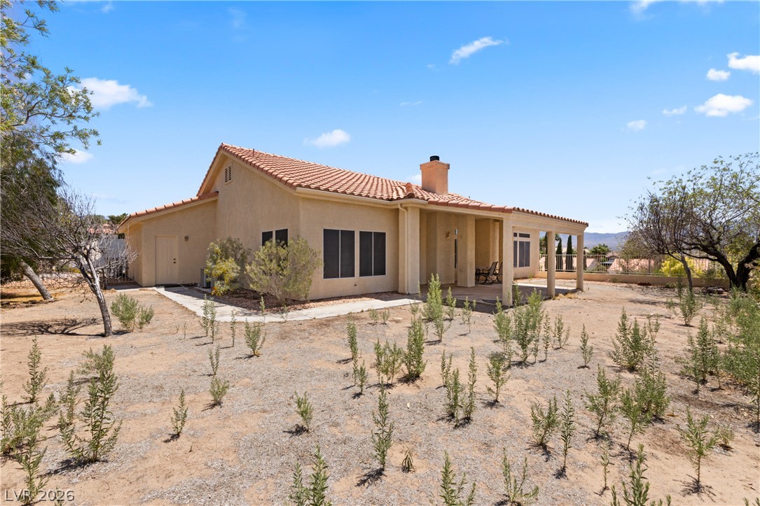 649 Rancho Circle Mesquite, NV 89027 - Photo 50 of 73 This desert dwelling features a spacious patio, offering tranquil outdoor living.