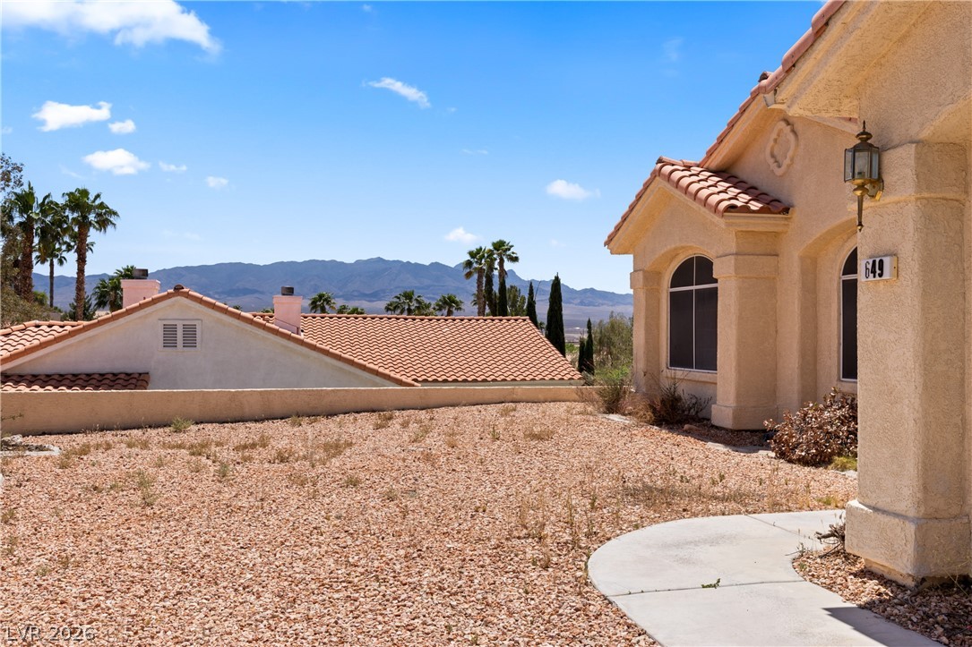 649 Rancho Circle Mesquite, NV 89027 - Photo 60 of 73 This charming residence offers a picturesque exterior with classic design elements.