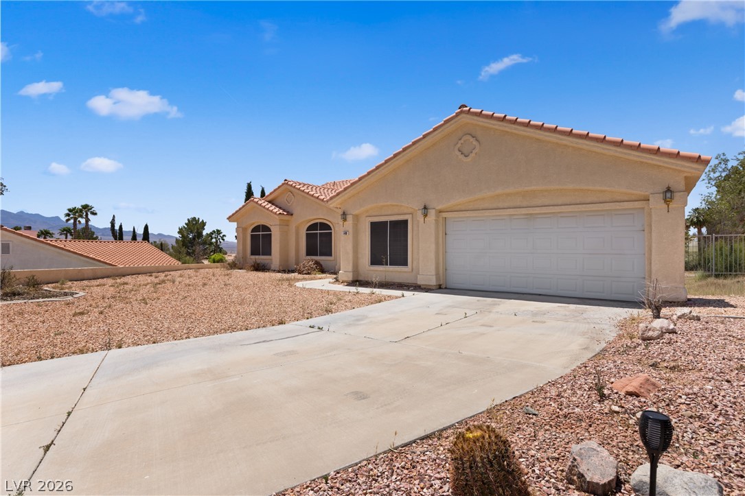 649 Rancho Circle Mesquite, NV 89027 - Photo 61 of 73 This desert oasis features a spacious layout and inviting curb appeal.