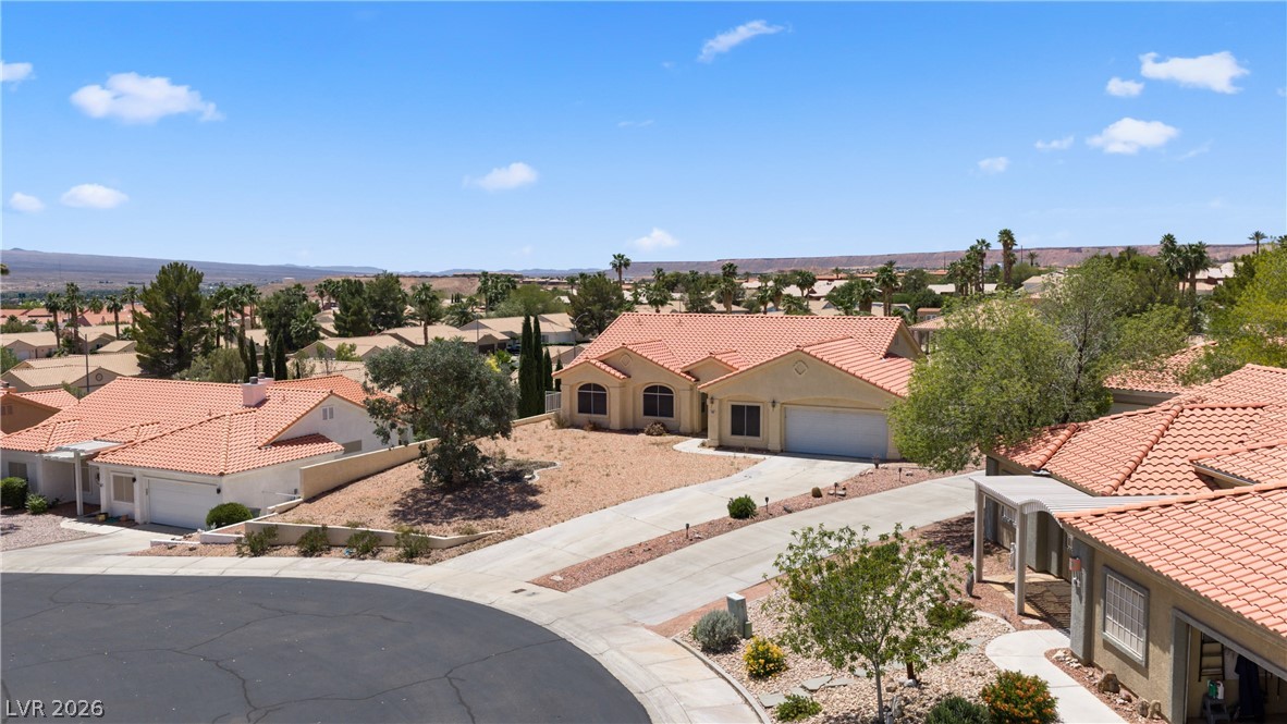 649 Rancho Circle Mesquite, NV 89027 - Photo 65 of 73 This captivating aerial view showcases a desirable neighborhood with inviting homes and scenic desert landscapes.