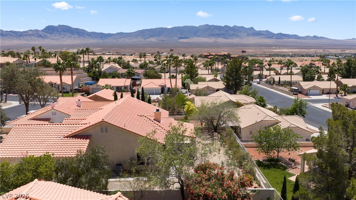 649 Rancho Circle Mesquite, NV 89027 - Photo 67 of 73 This elevated view captures a serene community nestled against a mountainous desert landscape.