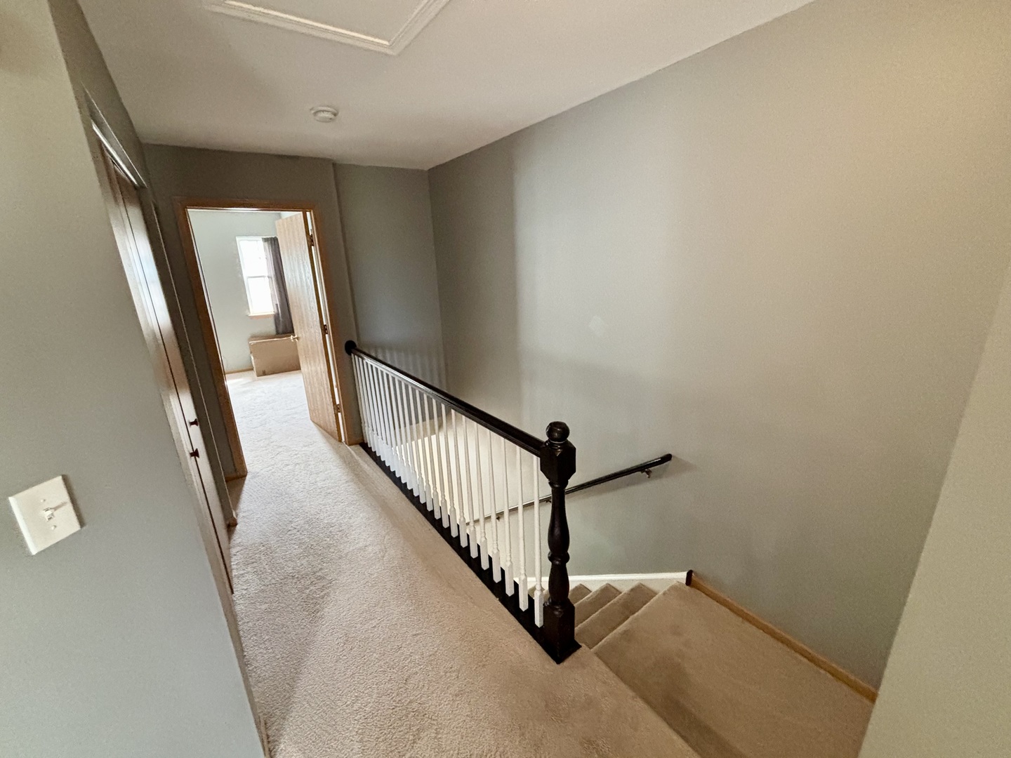 906 Clover Lane, Unit 906 Pingree Grove, IL 60140 - Photo 19 of 37 a view of a hallway with staircase