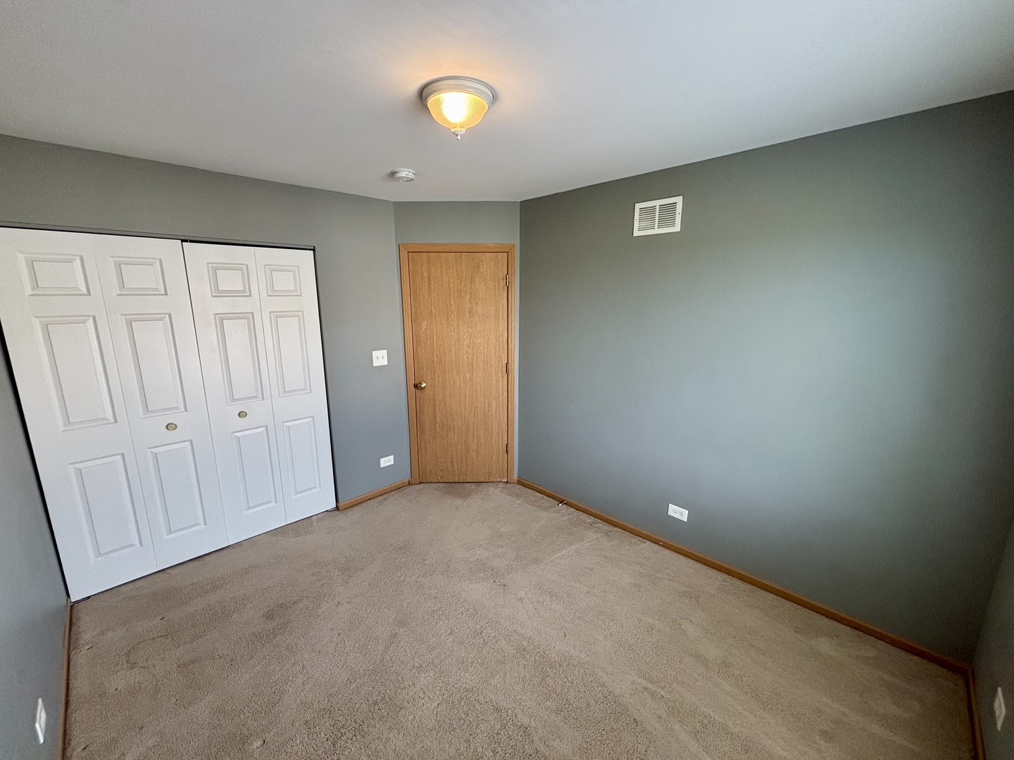 906 Clover Lane, Unit 906 Pingree Grove, IL 60140 - Photo 24 of 37 a view of an empty room